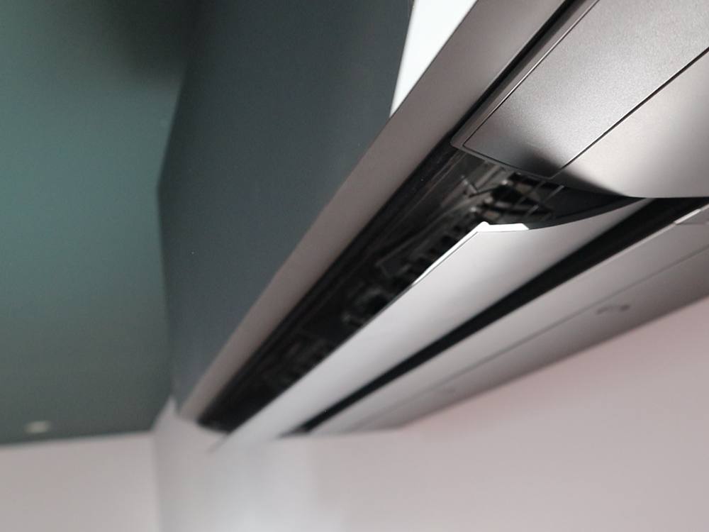 A wall-mounted air conditioning unit installed by NSS Electrics